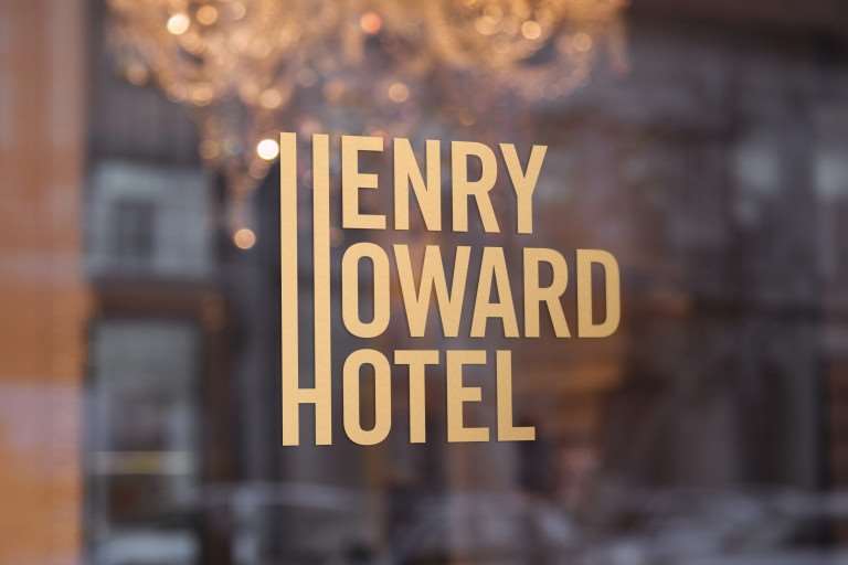 Henry Howard Hotel Ню Орлиънс Лого снимка